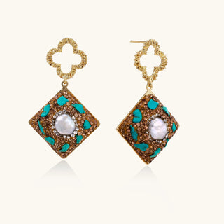 Gold-plated drop earrings with quatrefoil studs, diamond-shaped pendants featuring baroque pearls, turquoise stones, and amber crystals